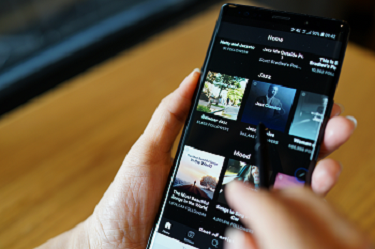 Music listener browsing through spotify app 