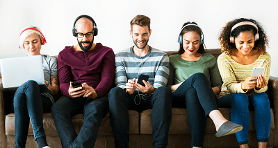 5 people listening to music with headphones on