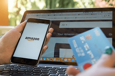 Amazon shopper making mobile purchase with credit card